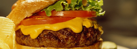 Wing Addiction Master Burgers stacked with fresh toppings