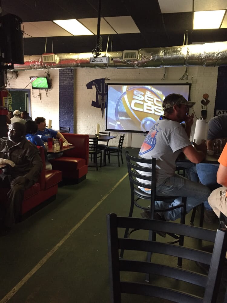 Wing Addiction 10-foot projection screen sports viewing area